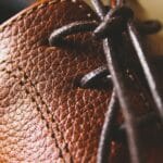 a close up of a brown leather shoe