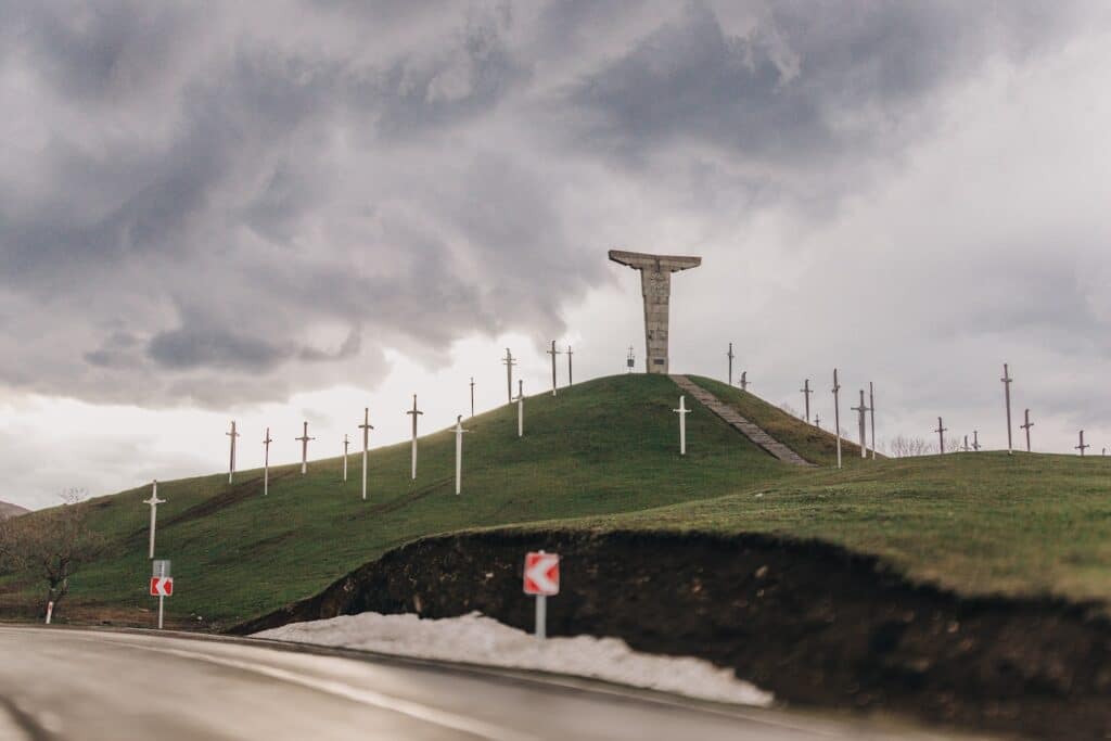 Ancient echoes and dramatic skies at the Didgori Monument in Georgia — a memorial site honoring the Battle of Didgori, one of the most significant moments in Georgian history. Surrounded by towering sword-shaped memorials and an atmosphere heavy with mist and symbolism, this place feels timeless — a blend of history, spirituality, and silence. Captured on a moody day when the clouds became part of the story.