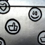 a bunch of stickers that are on a wall