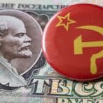 a button with a picture of a communist dictator on it