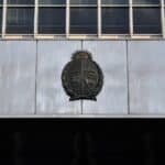 Emblem on a modern building facade