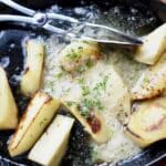 Roasted parsnips in a creamy sauce with herbs