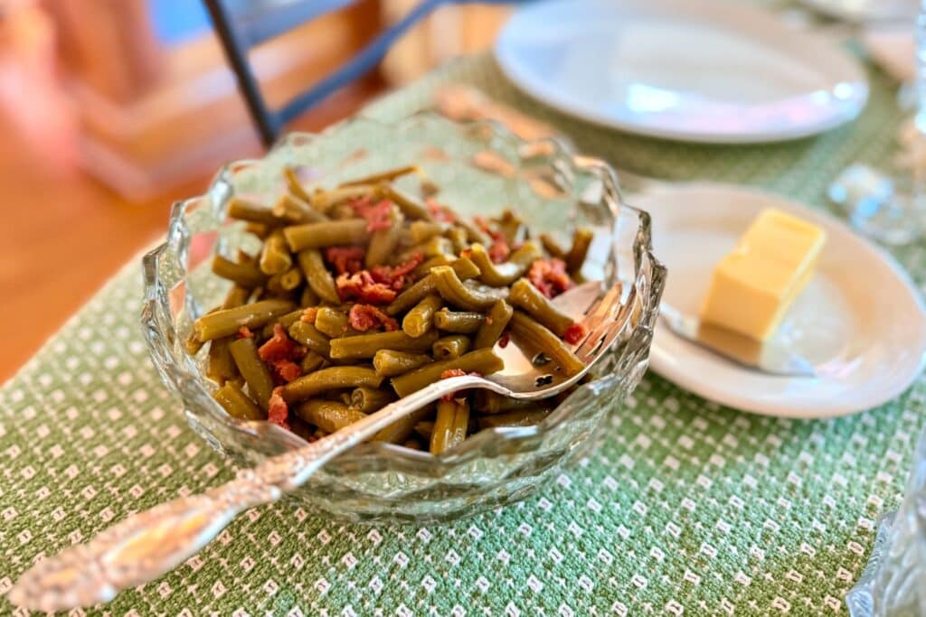 Green beans with bacon in a crystal bowl